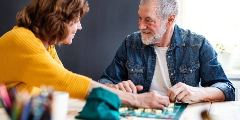 A couple playing board games