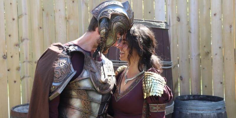 a couple in love dressed in Renaissance Fair costume