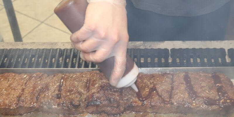 Timeline burger being cooked