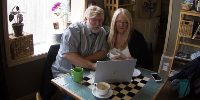 Gary and Michelle communicating while using the computer