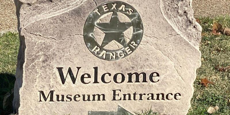 Rock at the entrance of the Texas Ranger Hall of Fame