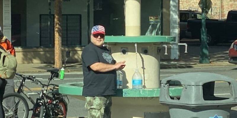 Gary filling water jugs at Hot Springs