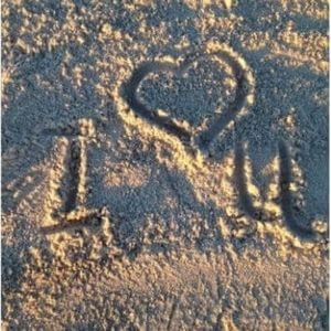 I Love you drawn in the sand