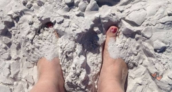 Feet in the sand