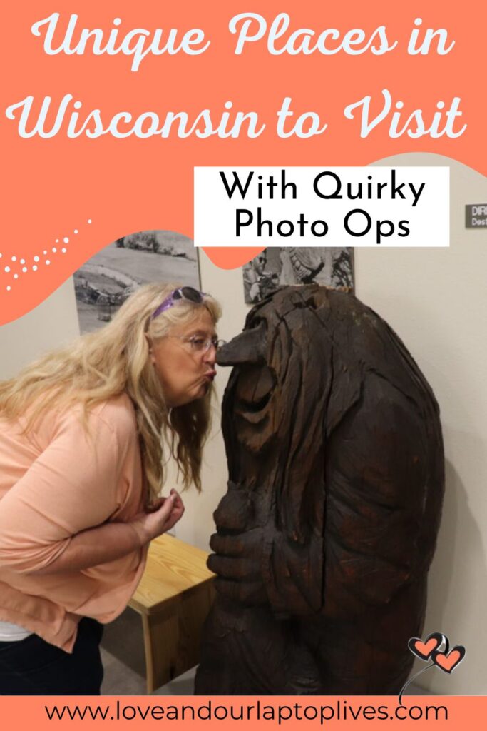 Michelle kissing a wooden troll